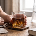 glass mug / whisky glass with a mountain shape inside